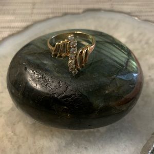 10 karat gold and diamond ring.